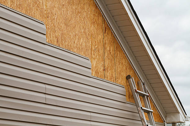 Professional Siding technician working in Leetonia, OH